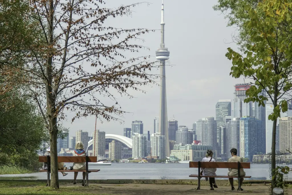 The Toronto skyline and CN Tower seen across the water from the Toronto Islands